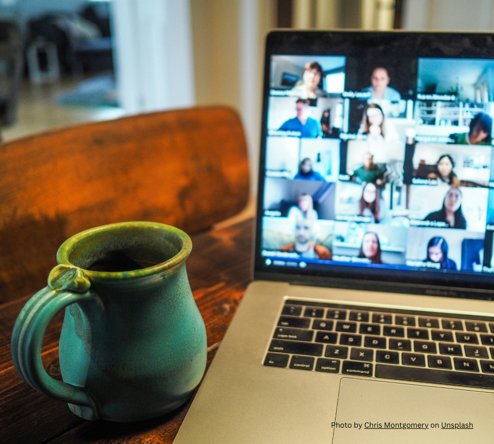 laptop ChatGPT said: ChatGPT A laptop on a table is open to a Zoom meeting, with a green coffee mug placed next to it.